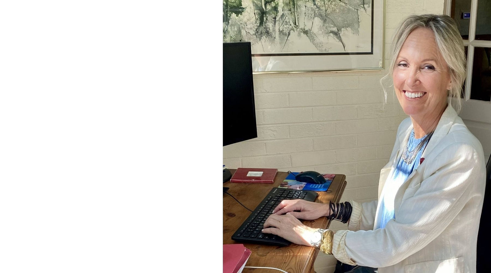 Woman sitting at computer working